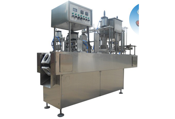 Yogurt cup filling and sealing machine