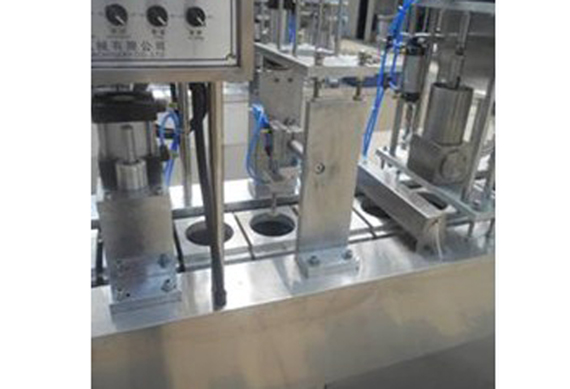 Yogurt cup filling and sealing machine