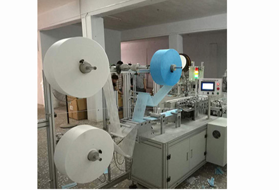 Semi automatic mask production machine