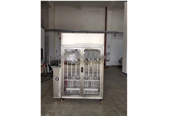 Automatic liquid bottle filling machine