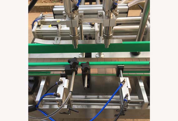 Manufacturer sales two heads filling machine two heads filler with capping labeling machine