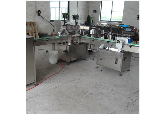 Shanghai automatic essential oil small bottle filling capping labeling machine