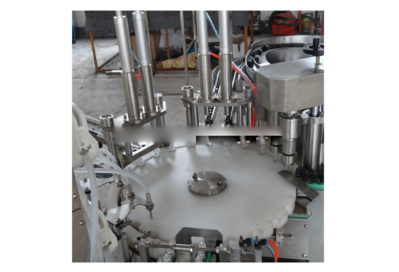 Shanghai automatic essential oil small bottle filling capping labeling machine