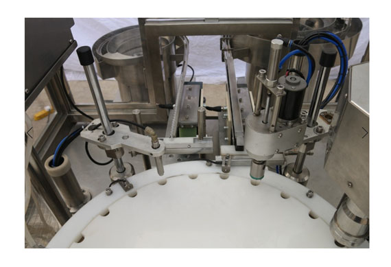 automatic ointment filling and capping machine