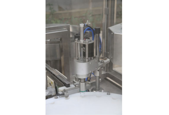 automatic ointment filling and capping machine