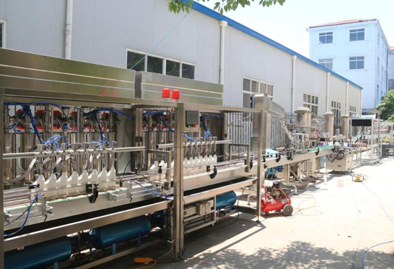 Automatic digital control liquid filling capping and labeling machine