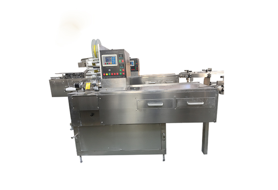 Automatic sugar cube wrapping machine