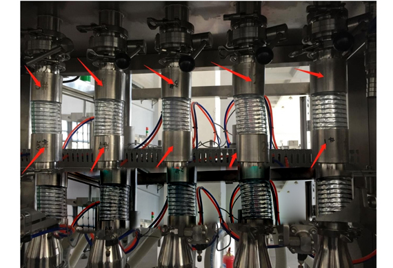 Automatic soda bottle filling and seaming machine