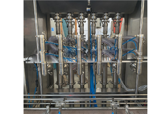 AUTOMATIC LIQUID/PASTE FILLING MACHINE Filling machine hot filling machine to make fruit juice